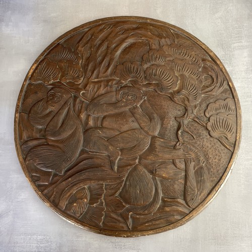 Plateau rond sculpté décor
