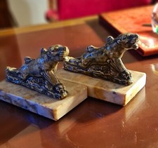 Paire de serre-livres faïence