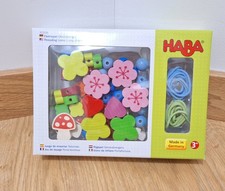 Jeu de laçage de perles