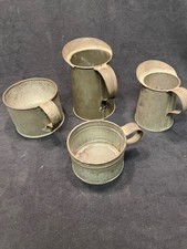 Tin ware antique - 2 mugs with handle, 2 pitchers.