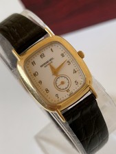 Montre femme Raymond Weil plaqué or 18 carats cadran blanc suisse rectangle...