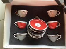 Lot de 6:TASSES et sous tasses. SAECO