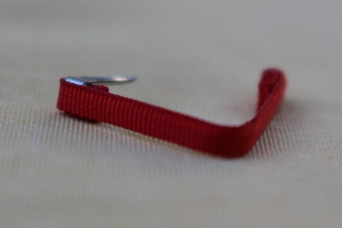 Fixe ruban rappel boutonnière