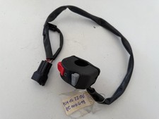 UN COMMODO COMMANDE DROIT MOTO