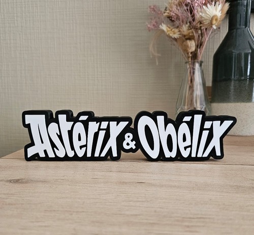 Logo astérix obélix - et,
