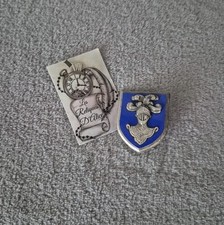 Insigne / pucelle école