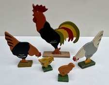 Lot 5 figurines bois peint -