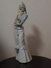 Lladro Company A Woman Holding