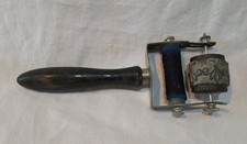 Ancien tampon manche en bois