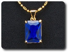 PENDENTIF SAPHIR BLEU 14 mm Plaqué Or 18 K.