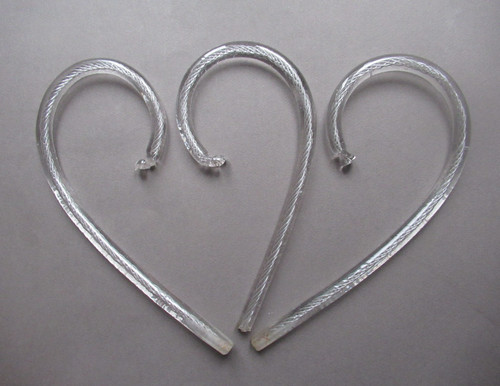 Twisted wire spun - spun, rods