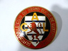 Plaque de calandre émaillée