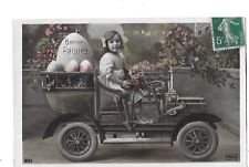 Old postcard Happy Easter pretty girl in car eggs
