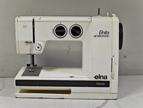 Machine coudre - À,