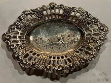Petit plat à fruit (noix, noisettes, etc...) en argent repoussé 1900