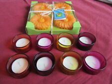 Lot de 8 photophores en verre coloré et 4 bougies oranges en forme de fleur