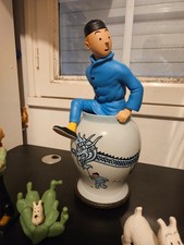 figurine tintin sortant de la