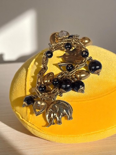 Bracelet vintage doré charms