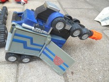 jouet ancien Camion TRANSFORMER Optimus Prime se transforme en fusil à pompe