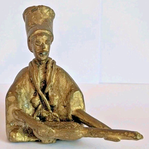 Vintage african seated hunter - vintage,