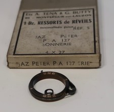 Ressort sonnerie pour réveil