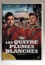 QUATRE PLUMES BLANCHES