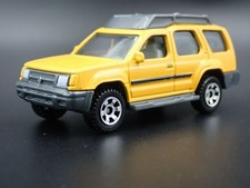 1999-2004 NISSAN XTERRA SUV YELLOW 1:64 SCALE COLLECTIBLE DIECAST MODEL CAR