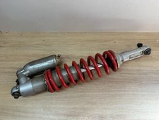 UN AMORTISSEUR ARRIERE MOTO