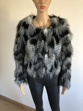 Manteau en fausse fourrure neuf taille S/M (valeur 63€)