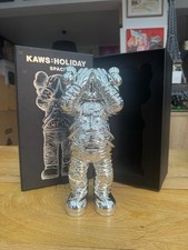 kaws holiday space silver 2020