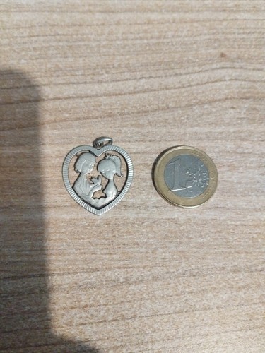 Belle medaille forme - en,