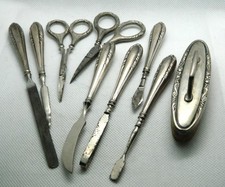 beautiful silver sleeve manicure tool set