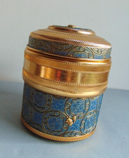 Pot à tabac musical tournant