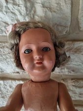 Poupee ancienne yeux bleux