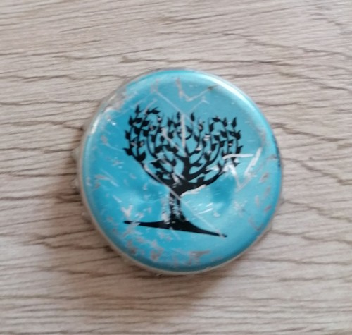 Capsule bière bleue avec