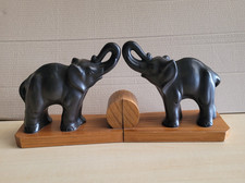 paire de serres  livres en céramique glaçure noire  sur socle bois