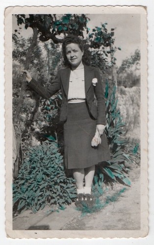 1940 woman and green plant - woman,