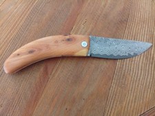 Couteau pliant deux clous