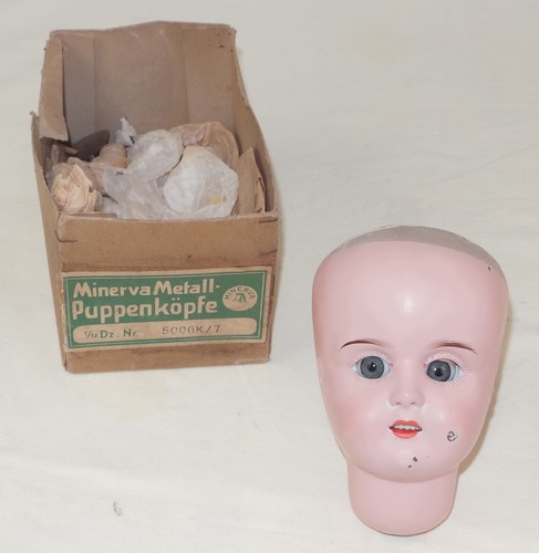 Minerva tête poupée en - de,