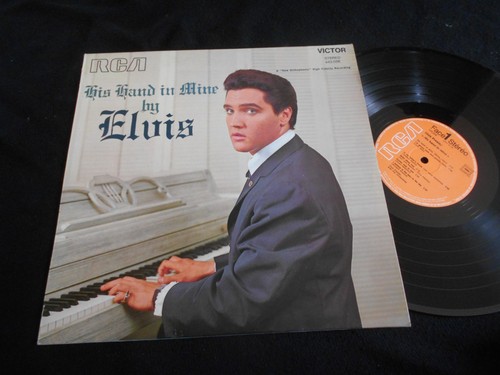 Elvis presley his - hand, in