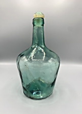 Old lady Jeanne V. LEVANTE, blue glass bottle