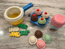 Lot of Fisher Price Fun With Food cupcake set, simmering soup pot, and ice cream