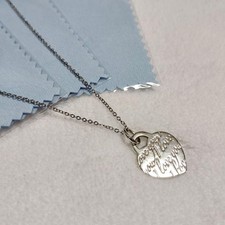 Tiffany & Co. Notes Heart Tag Necklace Pendant with Silver polishing cloth
