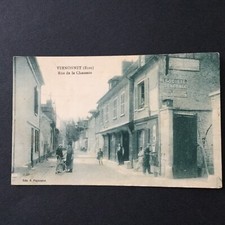 Old postcard 27 - Vernonnet Vernonnet rue de la Chaussée shops enamel plates Guérin