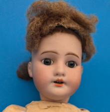 poupée ancienne 4 tête Porcelaine