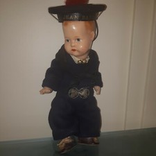 Belle poupée ancienne tenue