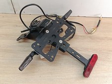 UNE BAVETTE ARRIERE RIZOMA