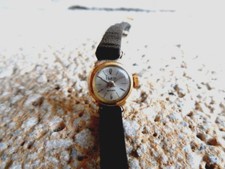 montre dame or 18k  tete