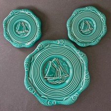 Ensemble dessous de plat et 2 dessous de bouteilles en céramique années 50/60