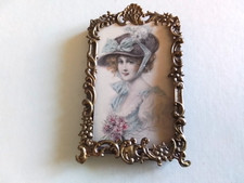 Joli petit cadre en laiton